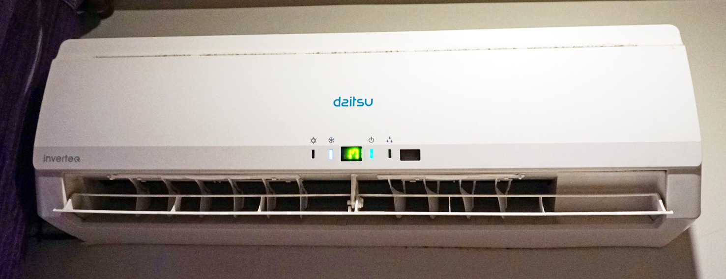 Wall-mounted split air conditioning unit